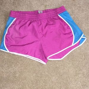 Magenta/purple stretchy runner shorts